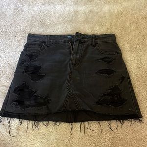 Black distressed mini skirt